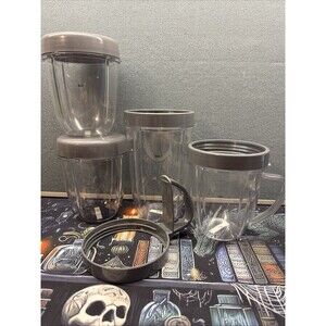 Nutribullet Lot Of 4 Replacement Cups With Lids